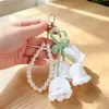 Llavero de cadena de perlas de ganchillo estilo Ins, accesorio para bolso, cadena de flores terminada, amuleto colgante femenino