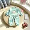 Conjunto infantil 2026 novo estilo coreano para meninas, moletom esportivo moderno e calça jogger, conjunto de duas peças da moda para exportação
