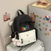 Nova Mochila Lisa Estilo Coreano, Mochila Escolar Casual e Leve para Alunos do Ensino Fundamental, Letras Bordadas de Alto Valor, Mochila para Alunos do Ensino Médio