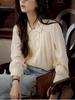 Camisa soligther francesa de lyocell de doble botonadura holgada con manga abullonada para otoño