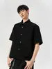 Camisa masculina de manga curta texturizada estilo americano, novo modelo de verão 2026, de alta qualidade, estilosa, solta e casual de meia-manga