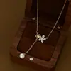 Cadena para Clavícula Elegante con Zirconia Galvanizada en Oro Real para Mujer, Collar de Perlas Retro Francés de Alta Gama, Collar con Borla Estilo Ins