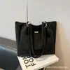 Bolsa de Ombro Único para Axila Feminina 2026 Nova Bolsa Tote de Grande Capacidade Bolsa de Mão Versátil Tendência de Nicho para Mulheres