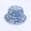 Nuevo sombrero de pescador de mezclilla japonés y coreano moda sombrero de sol con flores venta al por mayor 2024 primavera y verano protector solar ala ancha sombrero tipo cubeta transfronterizo