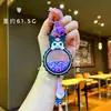 Llavero de Taza Planeta Sanrio Relleno de Aceite para Mujer Lindo Colgante de Arena Movediza Kuromi Colgante de Bolsa Adorno
