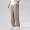 Pantalones de seda de hielo Amazon transfronterizos, pantalones cortos de secado rápido para hombre, pantalones largos casuales de estilo coreano modernos de corte holgado, pierna ajustada atlética