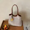 Bolsa Versátil Casual de Verano para Vacaciones Transfronteriza 2026 Tejida para Viajes Diarios Moda Simple Bolso de Hombro o Axila Tote