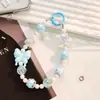 Pulsera funda de teléfono móvil pulsera corta lazo de alto sentido pulsera hecha a mano diy cadena de perlas accesorios para mujer al por mayor