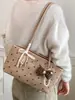 Bolso vintage de gran capacidad de alta moda, nuevo modelo otoño 2026, bolso de hombro simple, bolso tote de nicho estilo coreano para el día a día