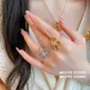 ¡Fashionista! Pendientes de botón de flor hueca de circón, elegantes y versátiles, pendientes de lujo ligero de alta gama para mujer, venta al por mayor
