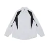 Camisa de rayas de bloques de color deconstruida retro americana con un diseño de alta gama, chaqueta camisa de cuello limpio para hombre