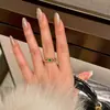 Anillo de Estrella Esmeralda de Lujo Ligero de Gama Alta Diamante Destellante Nicho Exquisito Simple Moda Nacional Nuevo Chino Anillo para Dedos Apilables