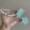 Atmósfera de verano collar de perlas flor de iris verde menta gargantilla para mujer lujo ligero nicho cadena de clavícula de alta gama
