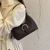 Versátil textura tejida nueva 2026 para mujer, exquisita bolsa diagonal retro para debajo del brazo, bolso de mano texturizado, bolso de hombro único para el commuting de otoño