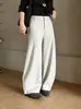 Pantalones de lana y acetato de pierna curva - adelgazantes, de cintura alta, casuales y con un diseño deconstruido