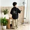 Polo Ligero para Niños con Adorno de Etiqueta 2026 Verano Nuevo Estampado de Panda Estilo Coreano Casual Camiseta de Moda para Niños Mayores