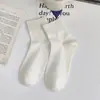 Calcetines para mujer primavera y otoño algodón peinado calcetines de media pantorrilla calcetines básicos lisos de moda para mujer calcetines hasta la rodilla calcetines blancos holgados