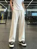 Calça masculina casual de veludo cotelê de perna reta com padrão ondulado para primavera e outono, calça de perna larga solta e modeladora