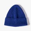 Otoño e invierno Nuevo gorro de lana color liso gorro de punto de placa ligera logo imitación piel de conejo cálido gorra para el frío fabricantes al por mayor