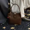 Bolsas Transfronteiriças para Mulheres 2025 Novo Outono e Inverno High-End Retro Luxo Leve Bolsas de Mão Versáteis para Trabalho e Deslocamento Bolsas Transversais