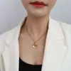 Marca estilo europeo y americano gargantilla personalidad temperamento colgante flor de tulipán collar cadena de clavícula de acero de titanio oro de 18 quilates