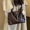 Mochila de Outono Ombro Único Trajeto Diário Portátil Nova Duas Alças Diagonal Feminina 2026 Estilo Coreano Transversal Versátil Moda