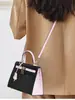 2025 Bolso Kelly Bloque de Color Bolso de Mano de Cuero Genuino Bolso de Hombro de Piel de Vaca Estampada en Palma Bolso Cruzado Moda Simple Transfronteriza