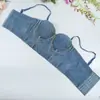 Bustier corsé estilo europeo y americano con varillas de pez, cadena de pedrería y copa incorporada, adecuado para actuaciones de hip-hop y rock, se usa sobre tirantes de mezclilla