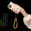 Cordão de celular Bodhi emparelhado com uma pequena fruta de bodhi amarela, uma nova corrente de celular estilo chinês e um acessório de pulso com contas estilo chinês
