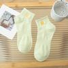 Calcetines de mujer primavera y verano letras color caramelo calcetines de media caña para mujer absorbentes de sudor transpirables calcetines de moda que combinan con todo