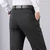 Calças casuais anti-rugas, calças profissionais de estilo americano para o dia a dia e trabalho, nova moda primavera e outono, calças masculinas versáteis de cor sólida de perna reta
