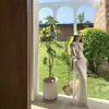 Traje Retro Francés de Lunares con Top Ajustado de Cuello Halter y Falda de Cintura Alta que se Ajusta a la Cadera Conjunto de Vestido de Dos Piezas