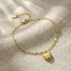 Pulseira Coração de Aço Inoxidável Novo Estilo Europeu e Americano Pulseira Versátil de Luxo Leve Popular no Instagram para Mulheres em Formato de Coração Personalizada