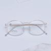 Armazón de gafas de titanio puro 6g al por mayor redondo TR90 tamaño pequeño armazón de gafas con chapado IP armazón de titanio transparente libro rojo pequeño 9882