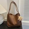 Texturizado grande capacidade retro 2023 Inverno nova cor sólida estilo ocidental casual simples moda viajante bolsa de ombro