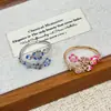 Anillo de Flor de Lujo Ligero Francés para Mujer Diseño de Nicho Abierto Ajustable Anillo para Dedo Índice Dedo Rosa Azul de Gama Alta