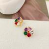 Aretes de flor de circón con forma de corazón de melocotón nuevos europeos y americanos chapados en oro real, aretes de diseño de nicho de lujo ligero, aretes de moda para mujer