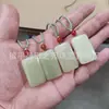 Venta al por mayor de fábrica colgante de calabaza de jade afgano blanco colgante de frijol de jade colgante de anillo de flor azul antiguo colgante de jade de tarjeta de nada