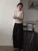 Top de punto de manga larga con cuello en V de dos piezas falsas de alta inteligencia de gama alta Qiaomi estilo 'old money' para mujer, capa interior de otoño, cárdigan, prenda exterior