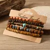 Amazon venta caliente transfronteriza pulsera de cuentas hecha a mano estilo retro para hombre pulsera de línea elástica multicapa con cuentas de madera árbol de la vida