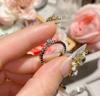 Anillo de lujo con diseño de panal de abeja, camelia, combinable con todo, de alta gama, con destellos brillantes y apilados para mujer.