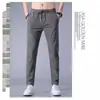 Comércio exterior fábrica original verão ultra-fino secagem rápida casual calça comprida masculina elástica calça esportiva calça de seda gelada slim fit