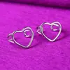 Taobao Wholesale Ear Cuff Estilo Coreano Chapado en Plata Joyería Hueco Forma de Corazón Pinza de Oreja para Mujer Pendiente de Plata Fabricante Wholesale