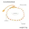 Estilo Francés Elegante Estilo Brillante Joyería de Lujo Ligero Diseño de Concha con Cuentas Hecho a Mano Acero de Titanio Chapado en Oro traje