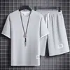 Traje casual de punto gofre para hombre, conjunto de camiseta casual de manga corta holgada de verano para hombre combinado con shorts deportivos elegantes/pieza