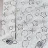 Estilo Punk Japonés Arte de Uñas Aleación Universo Planeta Hueco Estrella de Cinco Puntas Forma de Arroz Accesorios Metálicos para Uñas Joyería Más Vendida