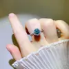 Anillo de moissanita verde de alta calidad para mujer, ambiente simple, superventas, variedad de anillos de lujo con diamantes completos, suministro estable al por mayor en stock