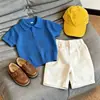 Ropa Infantil Coreana 2026 Verano Nuevo Estilo Azul Hoja Hueca Cuello Polo Tejido Manga Corta Infantil Casual Shorts Moderno