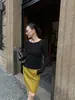 Camiseta Negra de Cuello Redondo Wanwei para Mujer 2026 Otoño Nueva Llegada Espalda Abierta Grande Doble Tirante Ajustado Manga Larga Top Y7009