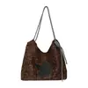 Bolso tote de lona casual súper popular estilo coreano para mujer 2026, estilo relajado diario, bolso de hombro y axila de gran capacidad para el trabajo